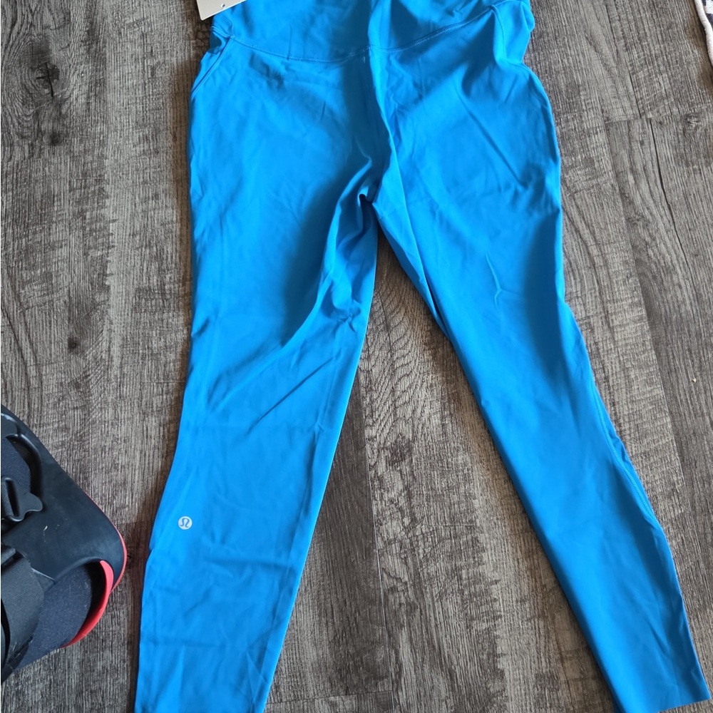 NWT size 12 lululemon Base Pase HR Tight 25” in poolside.